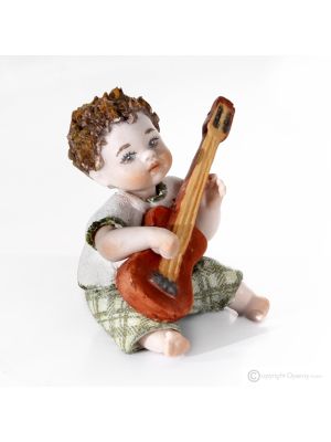 EDDIE - Pièces uniques : musicien avec guitare, poupées italiennes en porcelaine.