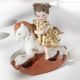 MIGNON HORSE F - Elégance intemporelle pour cette poupée en porcelaine artisanale.