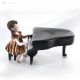 Figurine en porcelaine ELISA Capodimonte, élégance d'un musicien au piano.